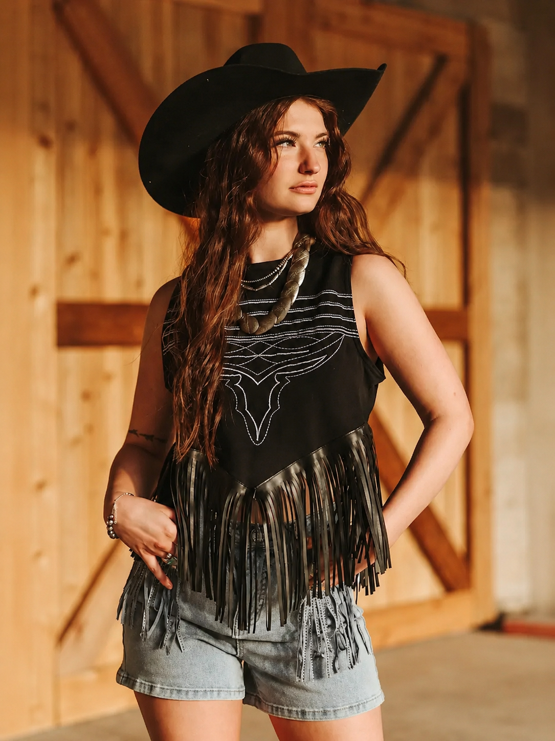 TO1259 Black Stitching Faux Leather Fringe Top